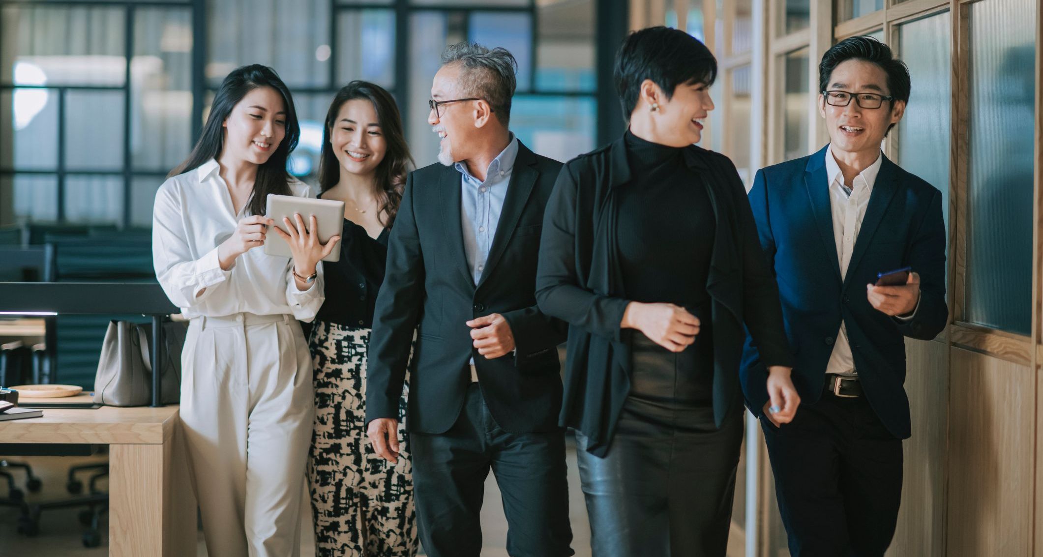 group of asian management team having discussion